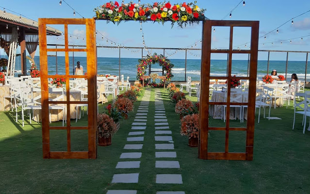 Top 20+ Romantic Beach Wedding Decor Ideas for Your Big Day Aliens tips Beach Wedding Decor Ideas, Romantic Beach Wedding, Starfish and Shells, Hanging Decorations, Bamboo Arch, Wooden Signs, Beach Umbrellas, Wooden Slice Centerpieces, Seashell Escort Cards, Driftwood Decor, Fairy Lights, Flower Garlands, Seaside-Inspired Favors, Beachy Escort Card Display, White Linens, Nautical Details, Seashell Bouquets, Wooden Benches, Sand-Filled Vases, Ocean-Inspired Invitations, Beachy Table Numbers, Sunset Serenade.